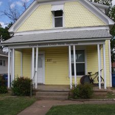Garth Brooks lived in this yellow house in Stillwater while attending Oklahoma State University. 